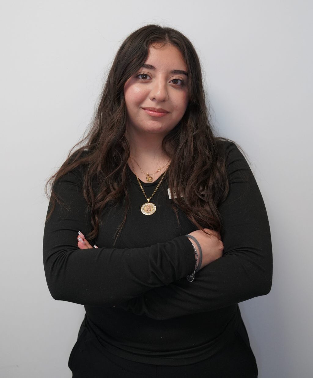 Brenda, Braces Now scheduling coordinator, smiling portrait.