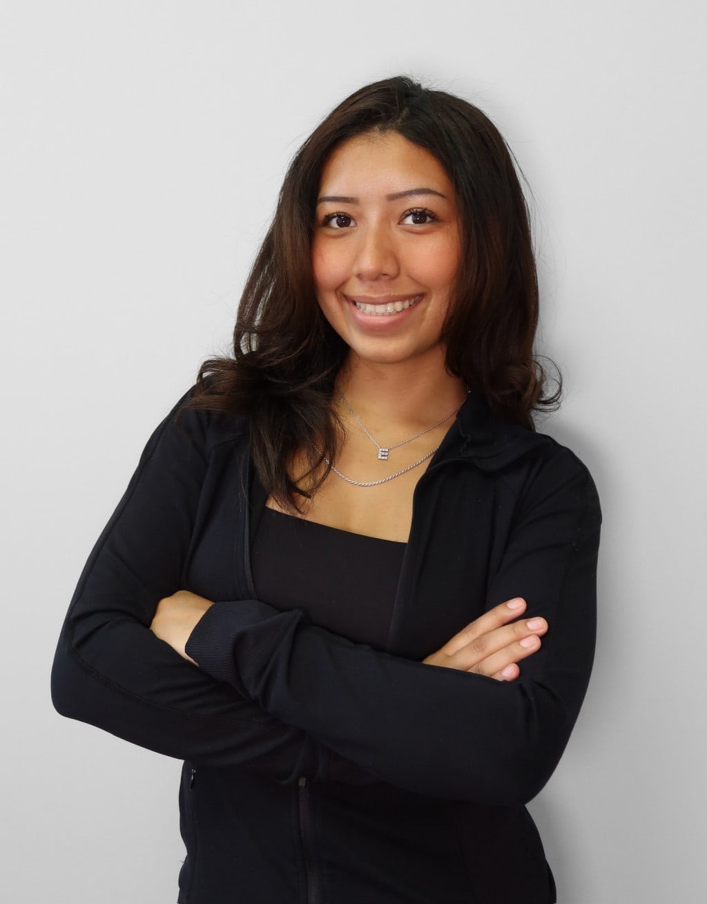 Erika, Braces Now Marketing Coordinator, smiling portrait.