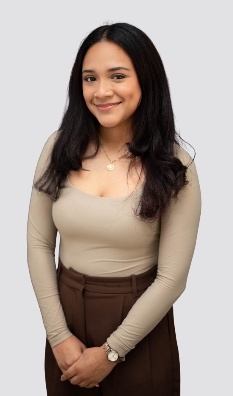 Leslie, Braces Now orthodontic assistant, smiling headshot.