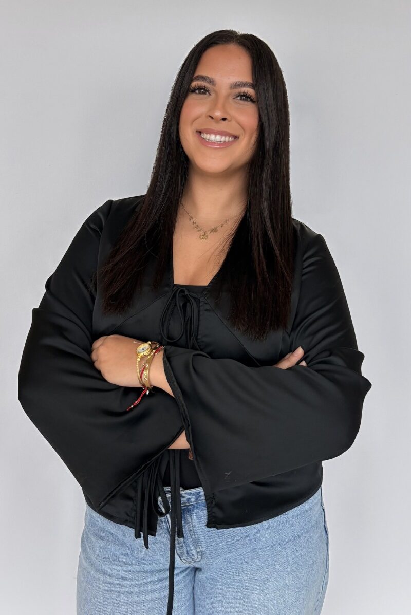 Sofia, Patient Relations Coordinator at Braces Now, smiling and looking approachable.